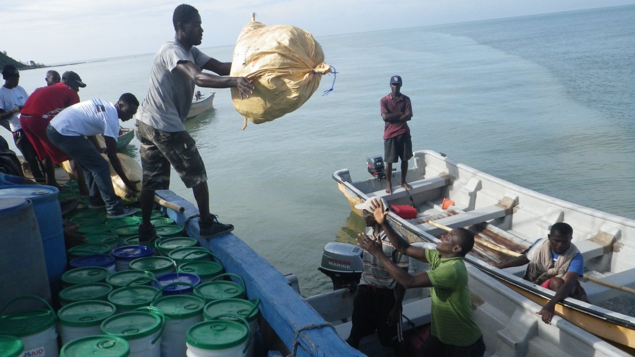 Handicap International emergency teams transporting humanitarian aid from Les Cayes harbor (south of the country) to Tiburon for people affected by Hurricane Matthew.